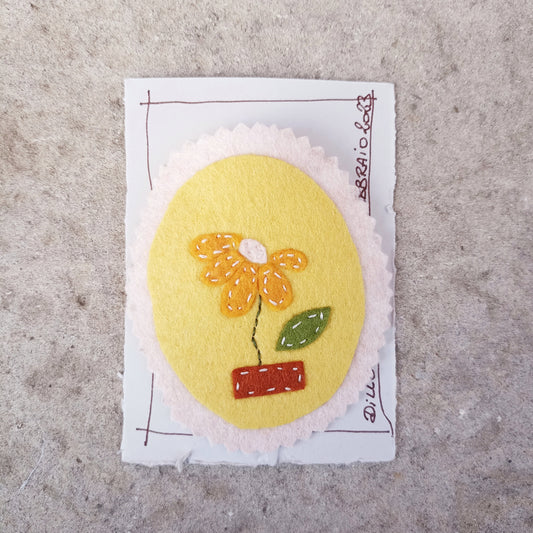 Spilla FIORE M'AMA NON M'AMA GIALLO