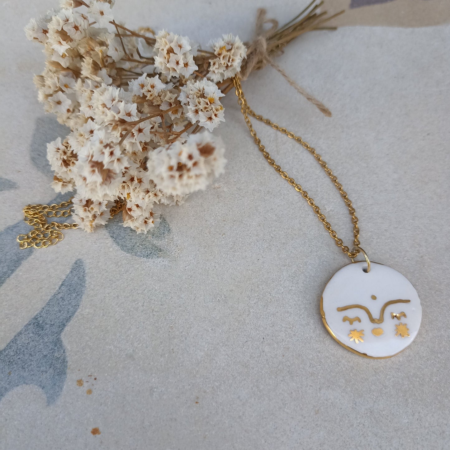 Collana LUNA PIENA BIANCA con scritta sul retro FLUISCI