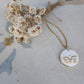 Collana LUNA PIENA BIANCA con scritta sul retro FLUISCI